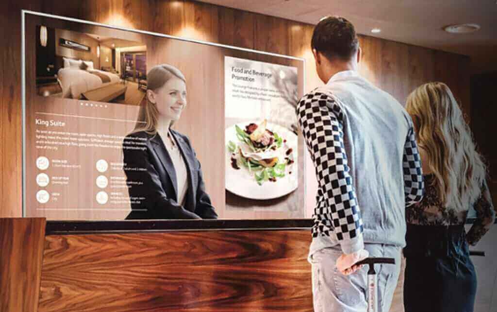 Interactive digital signage in hotel lobby displaying suite information and dining options to guests.
