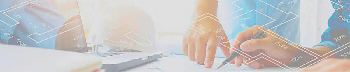 Collaborative teamwork on architectural blueprint with laptop and hands, professional planning process.