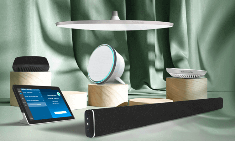 Innovative Stem audio devices on display, including tablet, soundbar, and ceiling speaker, with elegant green backdrop.